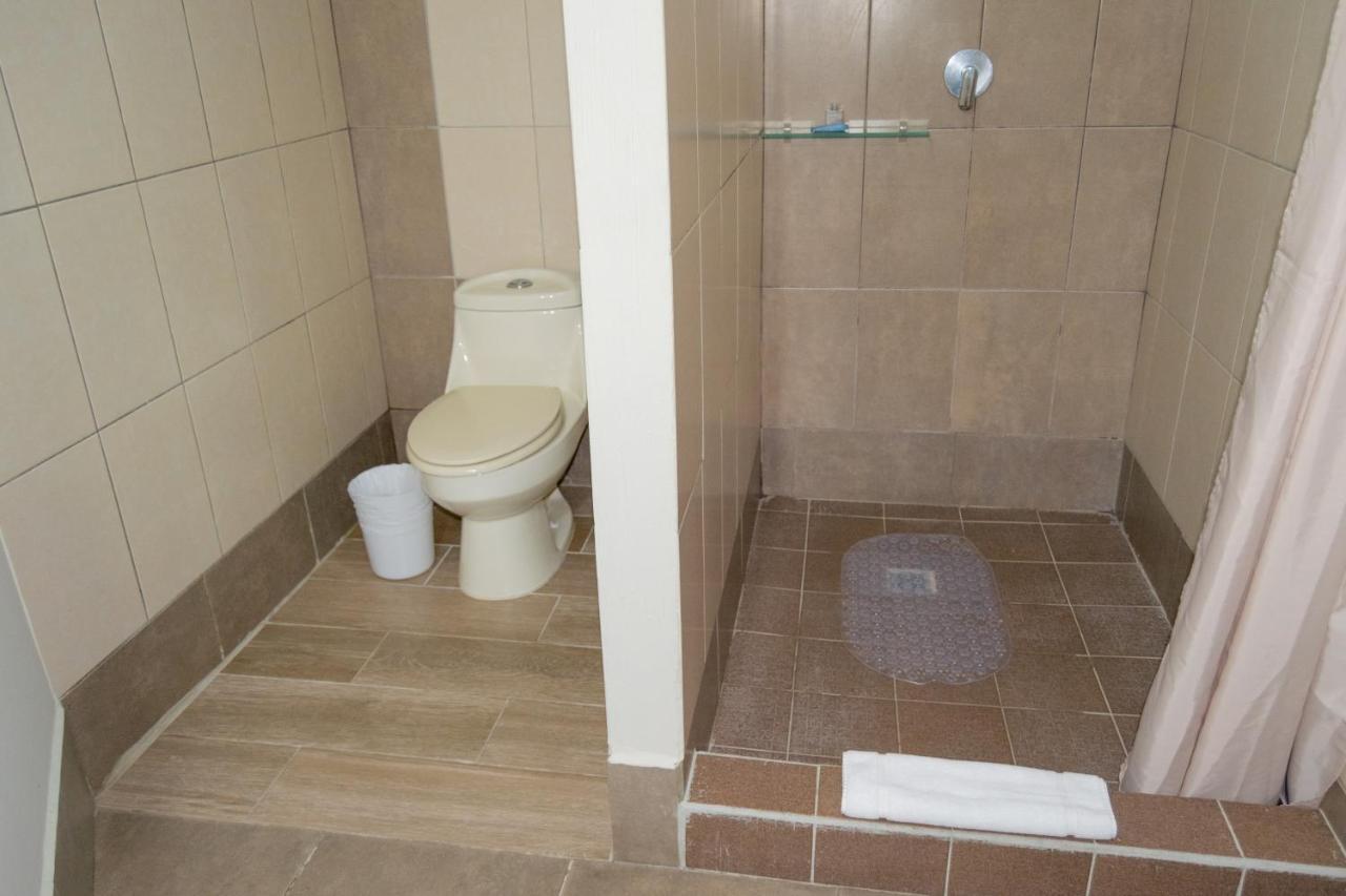 Hostal Donde Regina Guatemala City Exterior photo Bathroom with shower stall